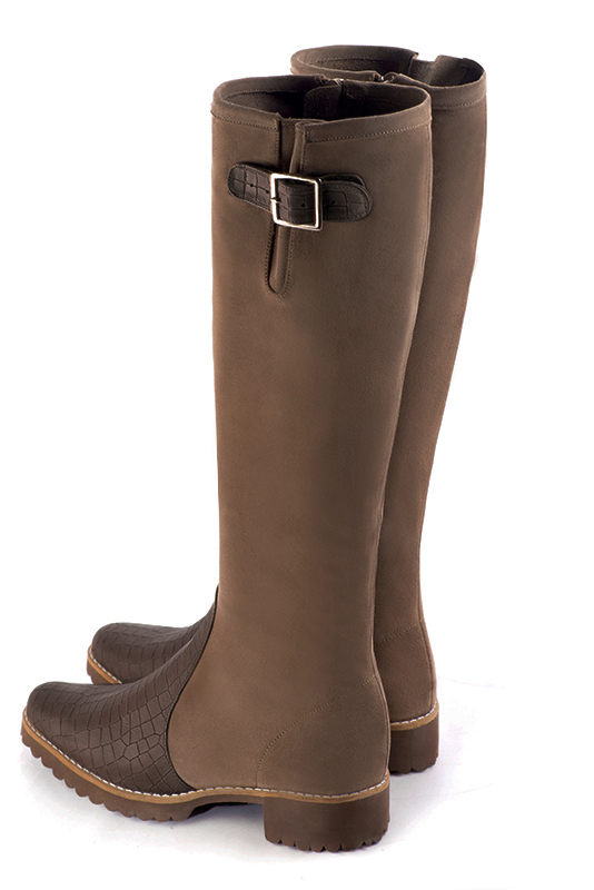French elegance and refinement for these dark brown knee-high boots with buckles, 
                available in many subtle leather and colour combinations. Record your foot and leg measurements.
We will adjust this beautiful boot with inner zip to your leg measurements in height and width.
The outer buckle allows for width adjustment.
You can customise the boot with your own materials, colours and heels on the "My Favourites" page.
 
                Made to measure. Especially suited to thin or thick calves.
                Matching clutches for parties, ceremonies and weddings.   
                You can customize these knee-high boots to perfectly match your tastes or needs, and have a unique model.  
                Choice of leathers, colours, knots and heels. 
                Wide range of materials and shades carefully chosen.  
                Rich collection of flat, low, mid and high heels.  
                Small and large shoe sizes - Florence KOOIJMAN
